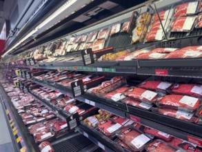 Calgary, Alberta, Canada. Feb 8, 2024. The meat department of a supermarket, complete with both