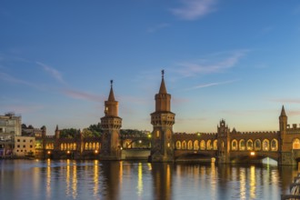 Berlin Germany, sunset city skyline at Oberbaum Bridge and Spree River