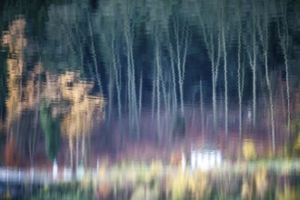 Reflections on a water surface in September