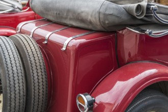 Convertible from behind with spare tyre - close-up of saloon