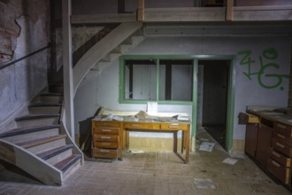 Old abandoned paper factory. Historic and typical factory building as a lost place. Destruction and