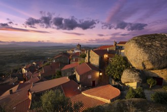 Monsanto historic village with stone boulder buildings and landscape at sunset, in Portugal