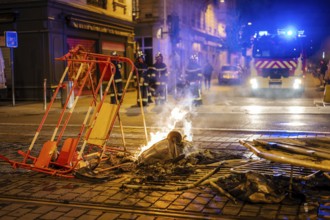 Bordeaux, France, April 17, 2023: Fire burning in the middle of a street of Bordeaux, France during