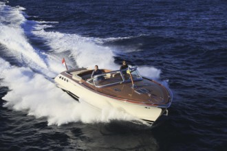 Aerial view sports boat J Craft 42 Torpedo R at full speed on the Cote d'Azur, luxurious motorboat