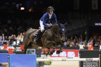 Julien Gonin of France competes in the equestrian Audi Grand Prix at Jumping International