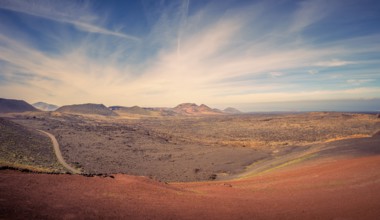 View on the desolate volcanic and moonlike landscape of Timanfaya National Park on Lanzarote, one