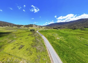 The view towards Crackenback over the Alpine Way road on a warm sunny summer's day in New South