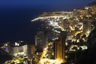 Monte Carlo panorama illuminated by night. Urban landscape with luxury architecture