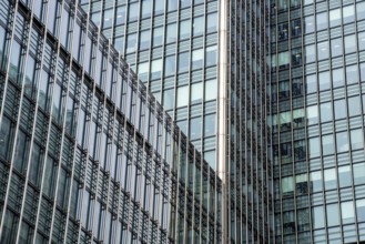 Abstract details of a modern glass skyscraper office building in the financial district