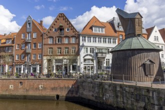 Historic half-timbered houses and gabled houses on the banks of the Old Hanseatic Harbour in the