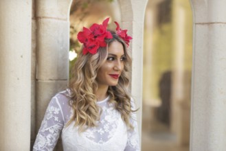 Portrait of beautiful blond girl in medieval dress with red diadem. Fairy tale scene