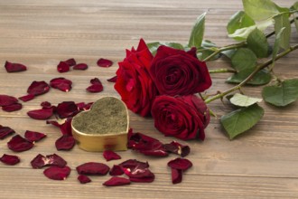 Roses as a gift and surprise for a celebration. Symbol photo for birthday, Mother's Day, love,