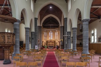 Bissegem, West Flanders Region, Belgium, 07 18 2021 The decorated interior of the Catholic church,