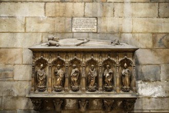Stone headstone in the Duomo. Milan, Italy.
