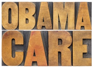 Obamacare typography - isolated word abstract in letterpress wood type