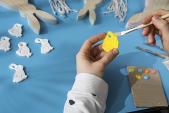 Master class of coloring Creator is using white air dry clay for making decor to EASTER holiday.