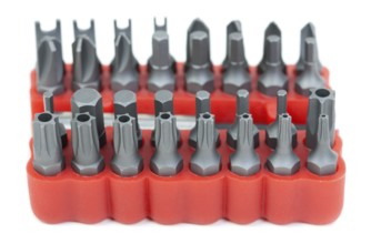 Set of heads for screwdriver in red box isolated on white background