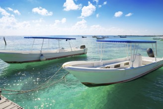 Puerto Morelos beach boats in Mayan Riviera Maya of Mexico
