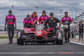 The crew of Dale Coyne Racing Honda prepare their race cars for the Big Machine Music City Grand