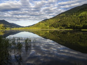 Clouds are reflected in the lake, Gaishorner See in the evening light, Gaishorn am See, Paltental,