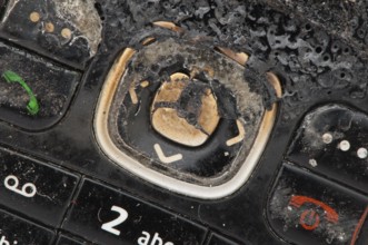 Burned GSM. Display and buttons close up