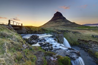 Kirkjufell with Kirkjufellsfoss in Iceland at sunset