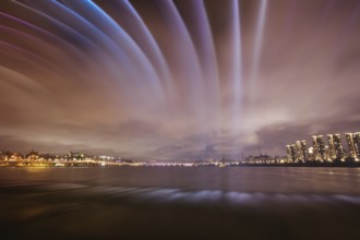 The famous Banpo Bridge is illuminated at night with water fountain display in Seoul, South Korea,