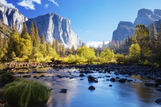 The view from within Yosemite Valley and Northside Drive of surrounding rock faces on a sunny