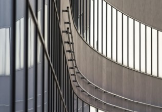 Fragment of high concrete building with empty windows