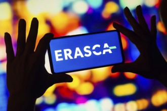 In this photo illustration, the Erasca logo is displayed on a smartphone mobile screen