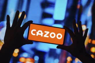 In this photo illustration, the Cazoo logo is displayed on a smartphone screen