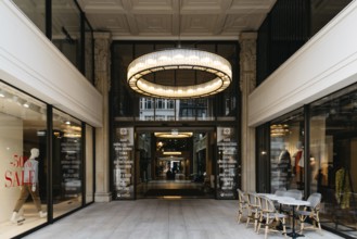 Hamburg, Germany, August 4, 2019: Luxury shopping center with fashion stores, Europe