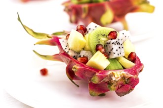 Half pitahaya filled with fruit salad