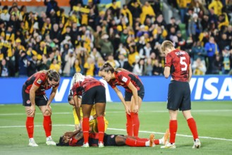 MELBOURNE, AUSTRALIA, JULY 31: Jayde RIVIERE of Canada goes down injured as Australia plays Canada