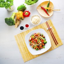 Sweet and sour chicken with rice and vegetables