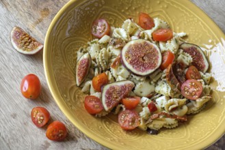 Italian pasta salad with figs and mini roma tomatoes