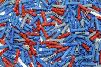 A lot of new multicoloured plastic dowels