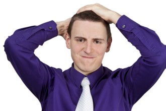 Young man with shirt and tie ruffling his hair - optional