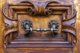 Close up of rustic old door in Florence, Italy, Europe