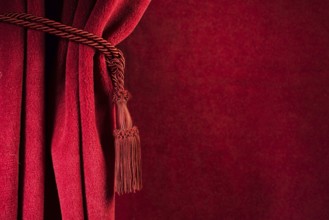 Red theatre curtain and red tassels