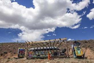 Scrap cars decorated with graffiti in the Carforest of Goldfield, Nevada, USA, North America
