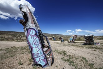 Scrap cars decorated with graffiti in the Carforest of Goldfield, Nevada, USA, North America