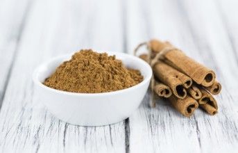Portion of fresh made Cinnamon (close-up shot, selective focus)