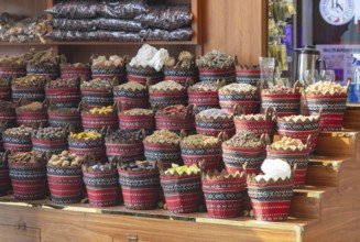 A picture of colorful spices on a store at the Dubai Spice Souk
