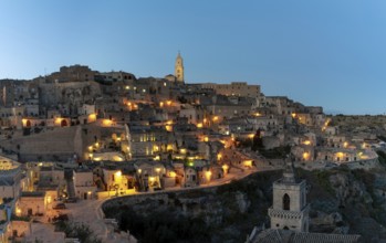 Matera, Italy, 26 November, 2023: view of the old town of Matera after sunset with the lights