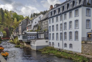Historical houses along the Rur River in the historic center of Monschau, Germany, Europe