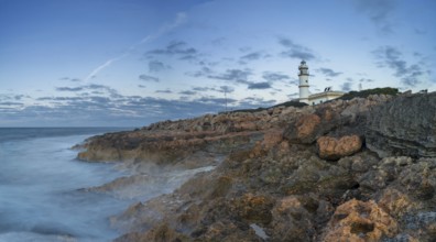A long exposure view of the Cap de ses Salines Lighthouse on Mallorca just before sunrise