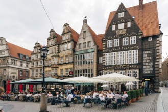 Bremen, Germany, August 6 2019: Restaurant terrace in historical centre of the medieval Hanseatic
