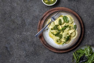 Food, Italian spinach ricotta ravioli, Top view, black background, copy space, Vegetarian food,