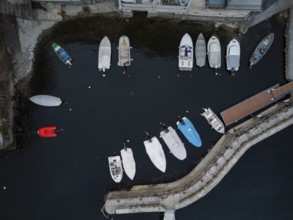 Aerial view of a dock with moored boats